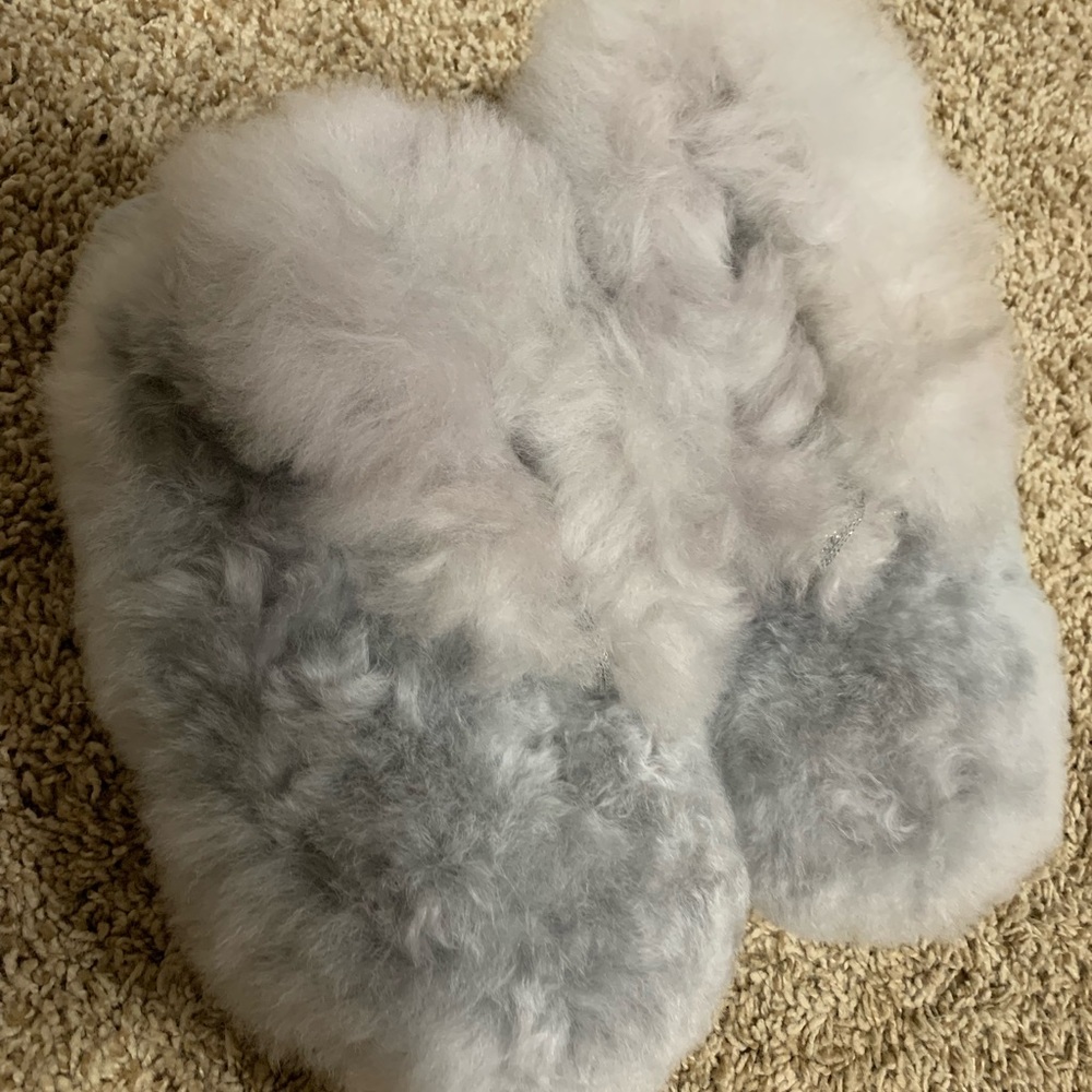 Brand new Alpaca fur slippers. Has memory foam on the sole for great support!